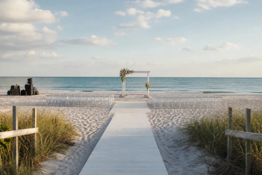 Gulf Coast beach ceremony setup with a stable aisle, weighted structure and organized equipment access