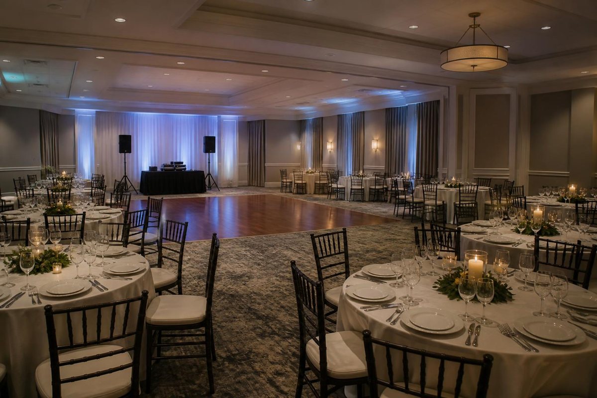 Dance floor and music area beside dinner tables